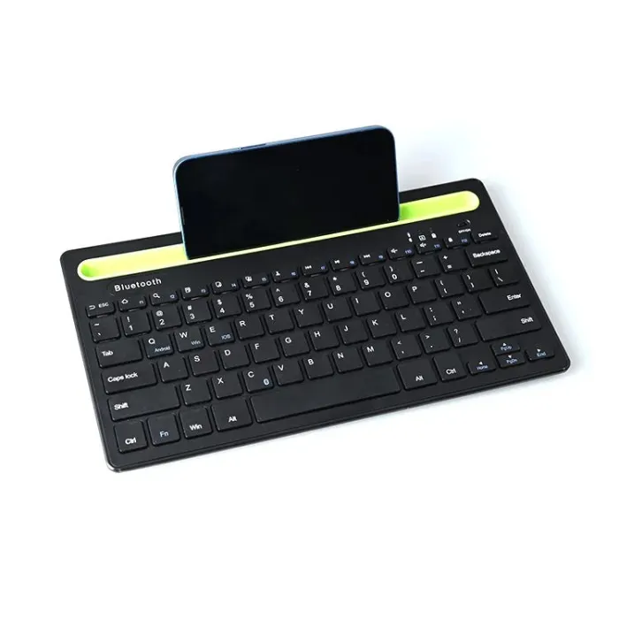 WIRELESS BLUETOOTH KEYBOARD WITH PHONE/TABLET HOLDER SLOT WIRELESS BLUETOOTH KEYBOARD WITH PHONE/TABLET HOLDER SLOT