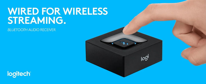 Logitech Bluetooth audio receiver with a hand touching it on a blue background