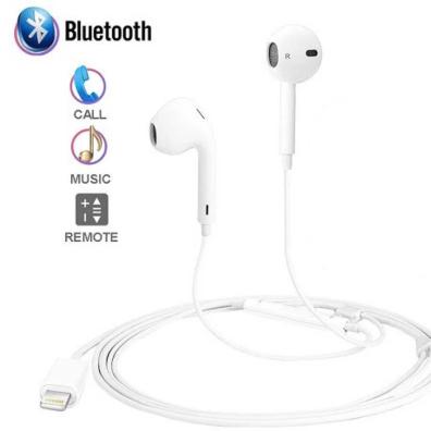 White Bluetooth earphones with control buttons on a white background