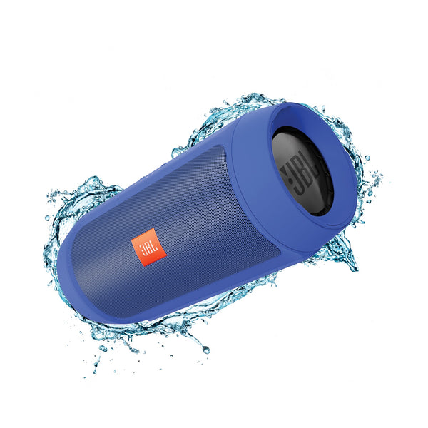Blue JBL speaker with water splashes on a white background